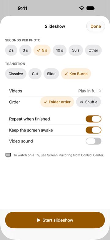 The Slideshow settings sheet: seconds per photo set to 5 s, Ken Burns transition, videos played in full, folder order, Repeat when finished and Keep the screen awake turned on, and a Start slideshow button.